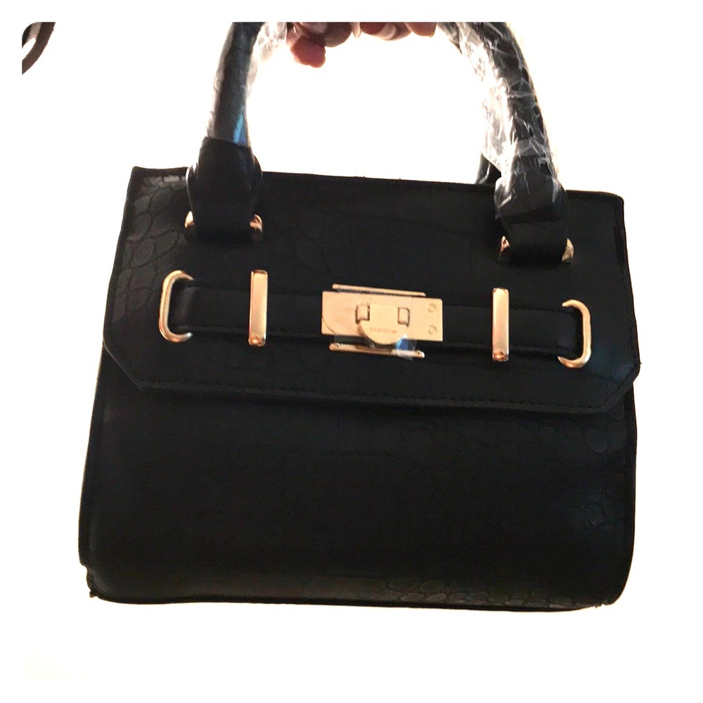 Brand new Bebe mini purse